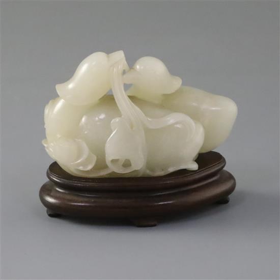 A good Chinese white jade group of two mandarin ducks biting lotus tendrils, 18th/19th century, L. 7.2cm